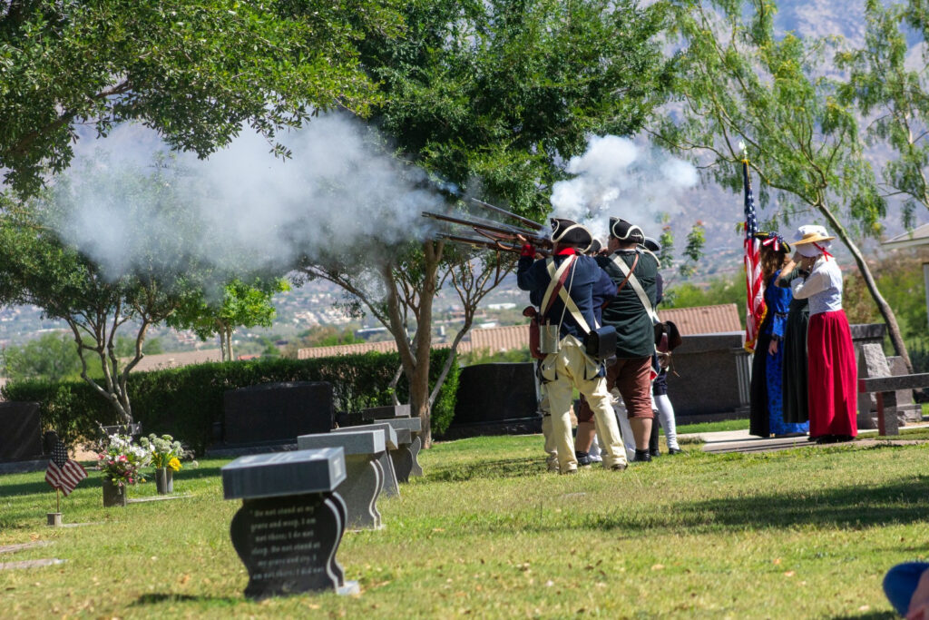 Flags on Tucson graves recall fallen on Memorial Day